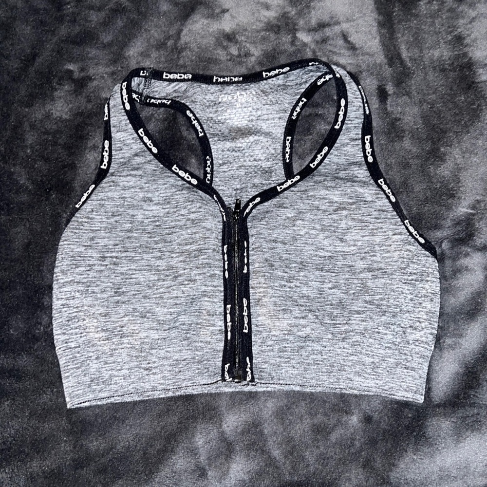 Bebe Sports bra size M, zips in the middle, gently worn
